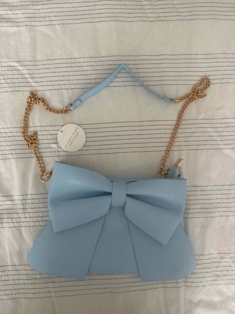 Altar'd State Pastel Blue Bow Crossbody with Gold Chain